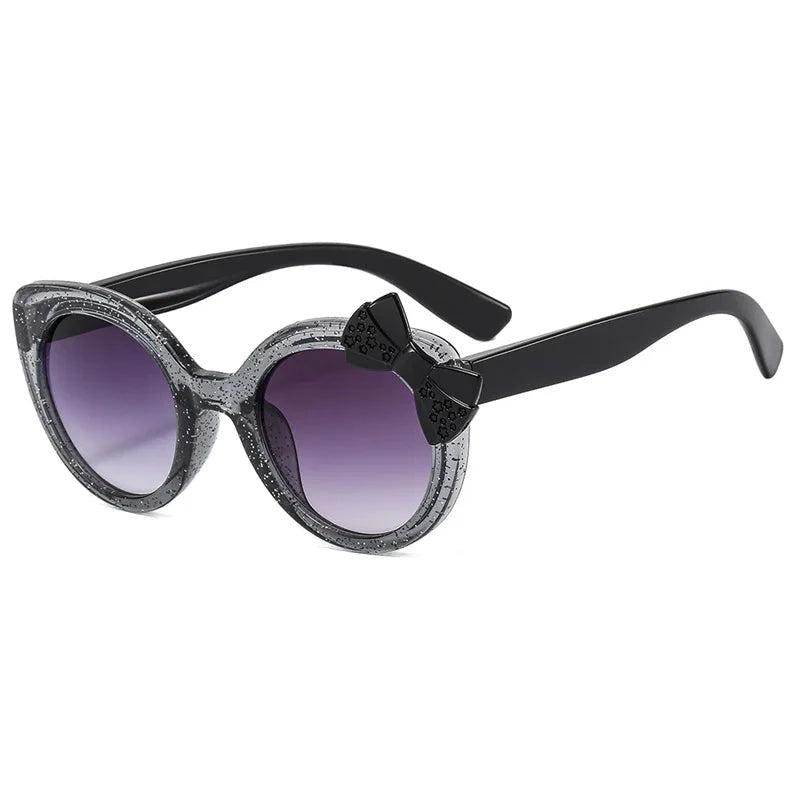 cat eye kids sunglasses, UV400 kids sunglasses, baby eyewear,
bowknot sunglasses, girls' fashion sunglasses, cute children's eyewear,
circular frame sunglasses, trendy baby shades, stylish girls' sunglasses, acrylic lenses, alla chic.