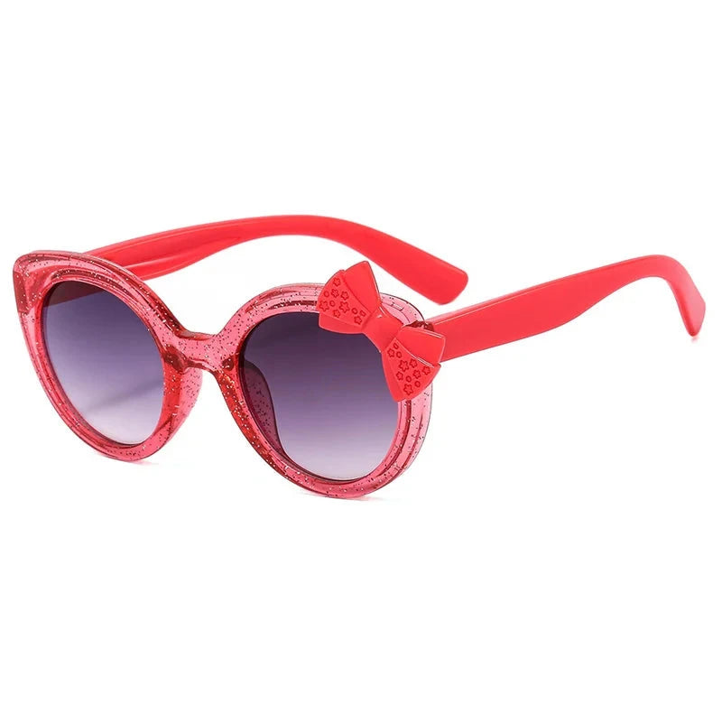 cat eye kids sunglasses, UV400 kids sunglasses, baby eyewear,
bowknot sunglasses, girls' fashion sunglasses, cute children's eyewear,
circular frame sunglasses, trendy baby shades, stylish girls' sunglasses, acrylic lenses, alla chic.