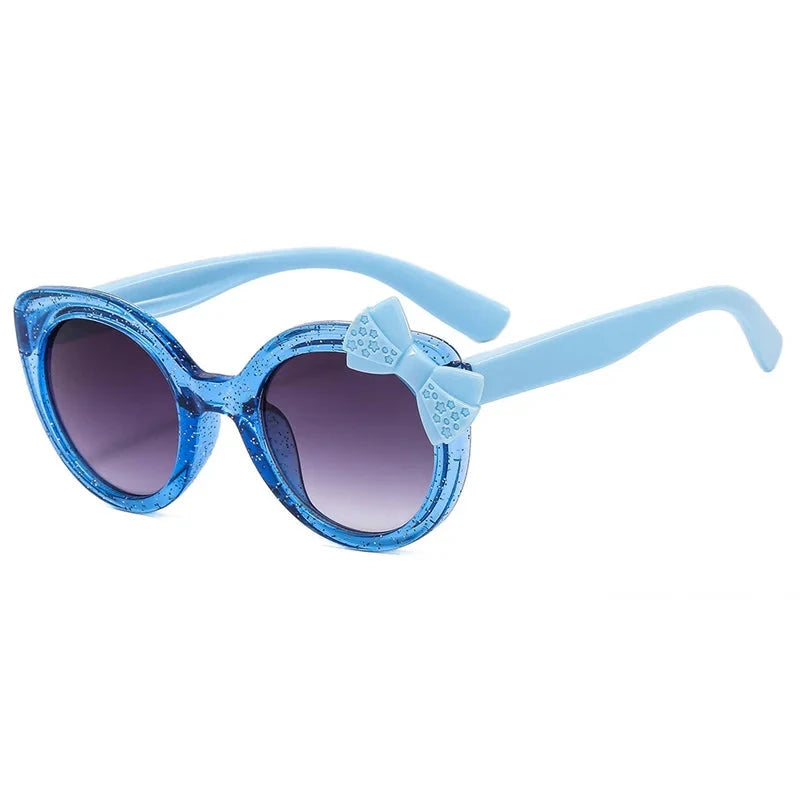 cat eye kids sunglasses, UV400 kids sunglasses, baby eyewear,
bowknot sunglasses, girls' fashion sunglasses, cute children's eyewear,
circular frame sunglasses, trendy baby shades, stylish girls' sunglasses, acrylic lenses, alla chic.