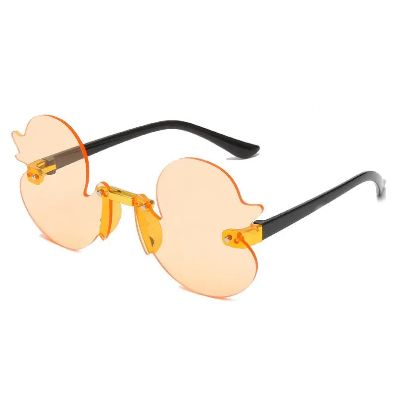 duck-shaped sunglasses, kids rimless eyewear, UV400 kids sunglasses, cartoon duck glasses, boys' fun sunglasses, anti-reflective sunglasses for kids, lightweight polycarbonate frames, kids decorative party glasses, playful sun protection, stylish children’s eyewear