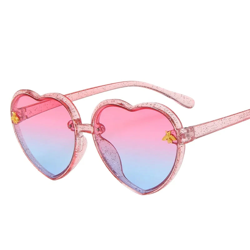 kids heart sunglasses, candy colour eyewear, UV400 kids glasses, cute cartoon sunglasses, trendy children’s eyewear, girls outdoor sunglasses, fashionable cat-eye frames, heart-shaped sun glasses, stylish kids eyewear, lightweight UV protection