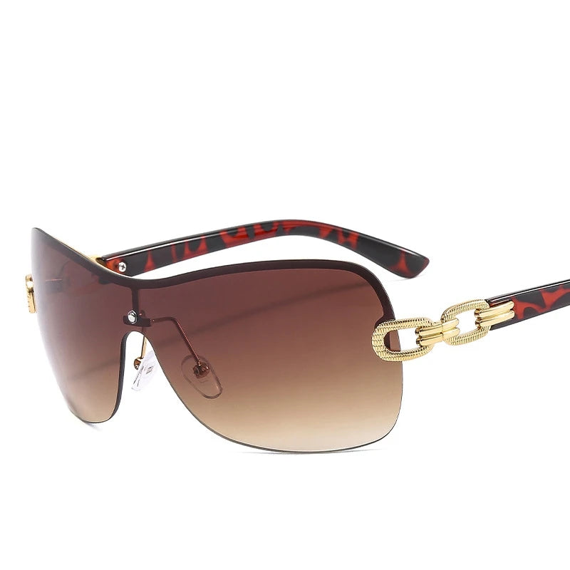 sunglasses, rimless sunglasses, heart-shaped sunglasses, 2000s fashion sunglasses, futuristic sunglasses, women's sunglasses, designer sunglasses, fashion sunglasses, unique sunglasses, lightweight sunglasses, comfortable sunglasses, UV protection sunglasses, stylish sunglasses, trendy sunglasses,