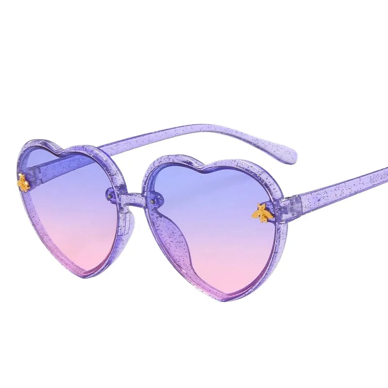 kids heart sunglasses, candy colour eyewear, UV400 kids glasses, cute cartoon sunglasses, trendy children’s eyewear, girls outdoor sunglasses, fashionable cat-eye frames, heart-shaped sun glasses, stylish kids eyewear, lightweight UV protection