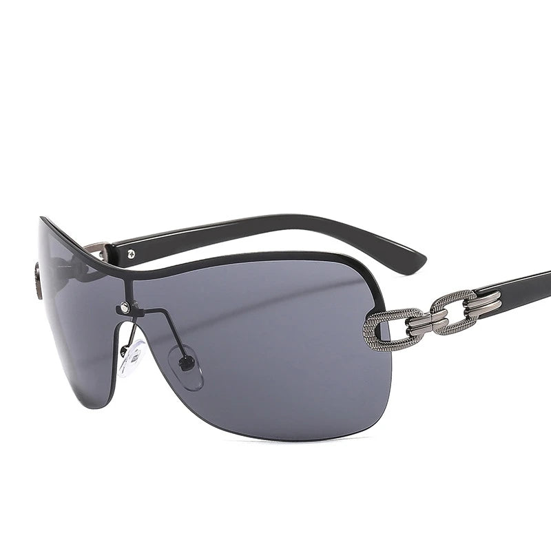 sunglasses, rimless sunglasses, heart-shaped sunglasses, 2000s fashion sunglasses, futuristic sunglasses, women's sunglasses, designer sunglasses, fashion sunglasses, unique sunglasses, lightweight sunglasses, comfortable sunglasses, UV protection sunglasses, stylish sunglasses, trendy sunglasses,