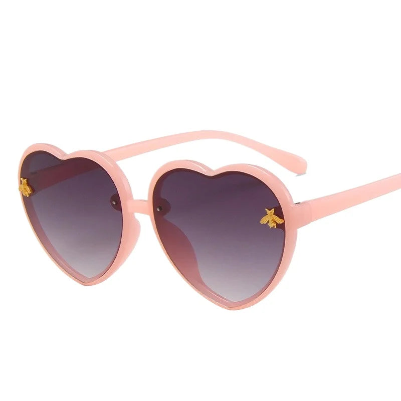 kids heart sunglasses, candy colour eyewear, UV400 kids glasses, cute cartoon sunglasses, trendy children’s eyewear, girls outdoor sunglasses, fashionable cat-eye frames, heart-shaped sun glasses, stylish kids eyewear, lightweight UV protection