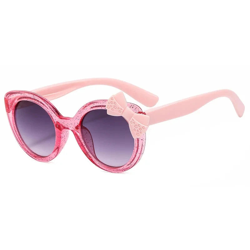 cat eye kids sunglasses, UV400 kids sunglasses, baby eyewear, 
bowknot sunglasses, girls' fashion sunglasses, cute children's eyewear, 
circular frame sunglasses, trendy baby shades, stylish girls' sunglasses, acrylic lenses, alla chic.