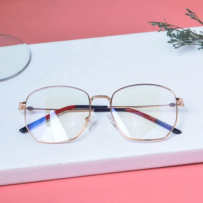 Blue light glasses, anti-reflective lenses, stainless steel frame, unisex eyewear, casual glasses, custom reading glasses, optical lenses, computer glasses, classic eyewear, protective glasses.