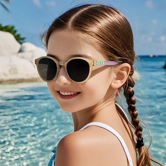 kids polarised sunglasses, round children eyewear, UV400 protection for kids, stylish baby sunglasses, TR-90 kids frames, circular kids sunglasses, glare-reducing eyewear, girls' trendy sunglasses, vintage-inspired kids glasses, lightweight baby sun goggles