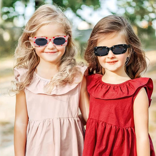 kids heart-shaped sunglasses, rectangular polarised eyewear, UV400 kids glasses, girls’ vintage sunglasses, trendy kids sun protection, outdoor kids eyewear, stylish wrap sunglasses, lightweight child sun shades, polycarbonate sunglasses for kids, glare-reducing eyewear