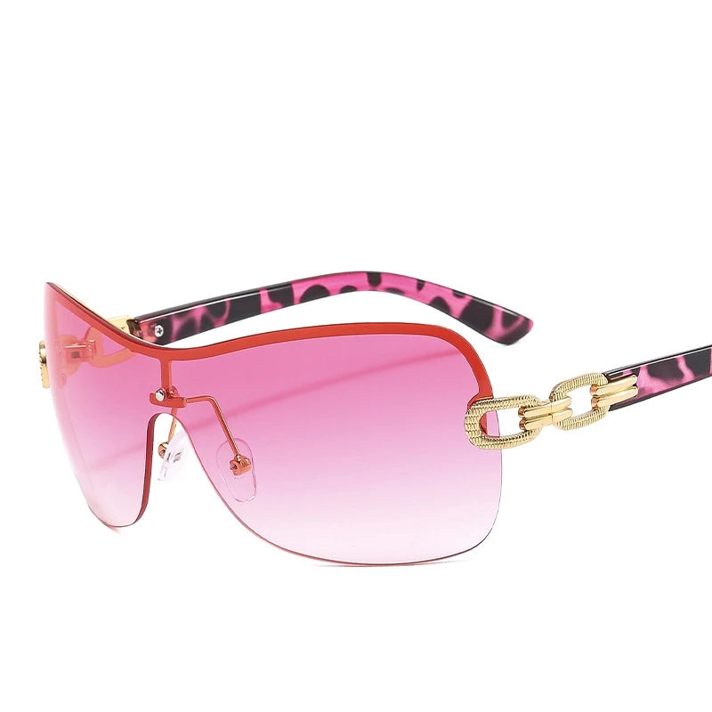 sunglasses, rimless sunglasses, heart-shaped sunglasses, 2000s fashion sunglasses, futuristic sunglasses, women's sunglasses, designer sunglasses, fashion sunglasses, unique sunglasses, lightweight sunglasses, comfortable sunglasses, UV protection sunglasses, stylish sunglasses, trendy sunglasses, 